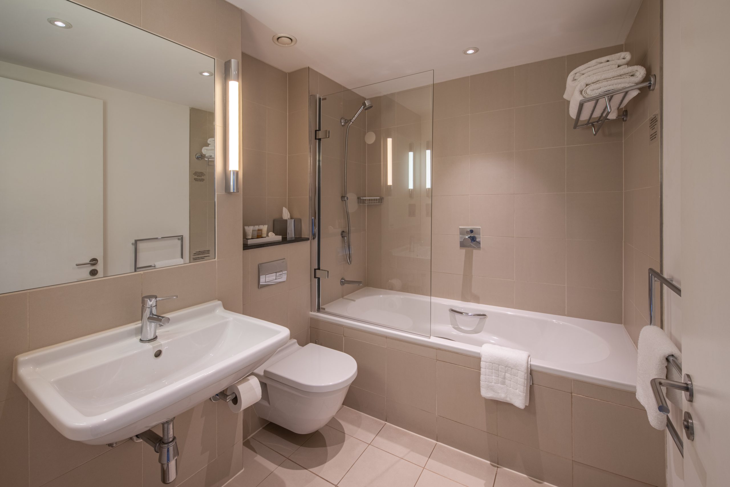 Deluxe bathroom with a built in shower and bathtub, located in Liverpool.