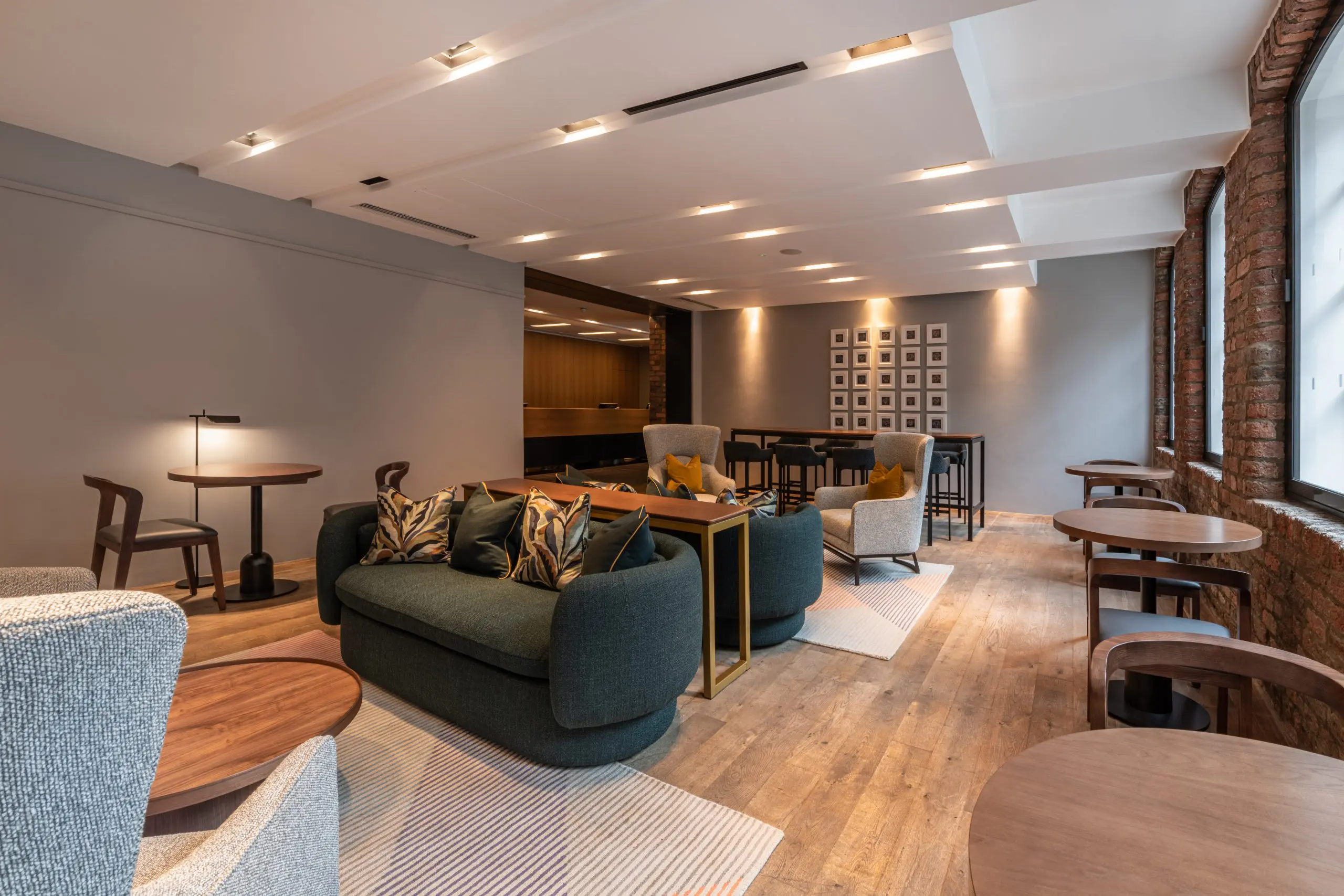 The Resident Liverpool lounge with multiple seating areas and coffee tables.