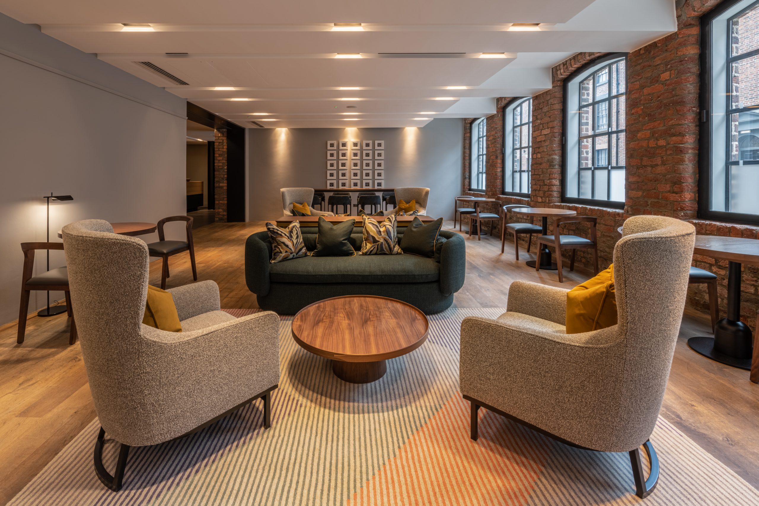 The Resident Liverpool lounge with multiple seating areas and coffee tables.