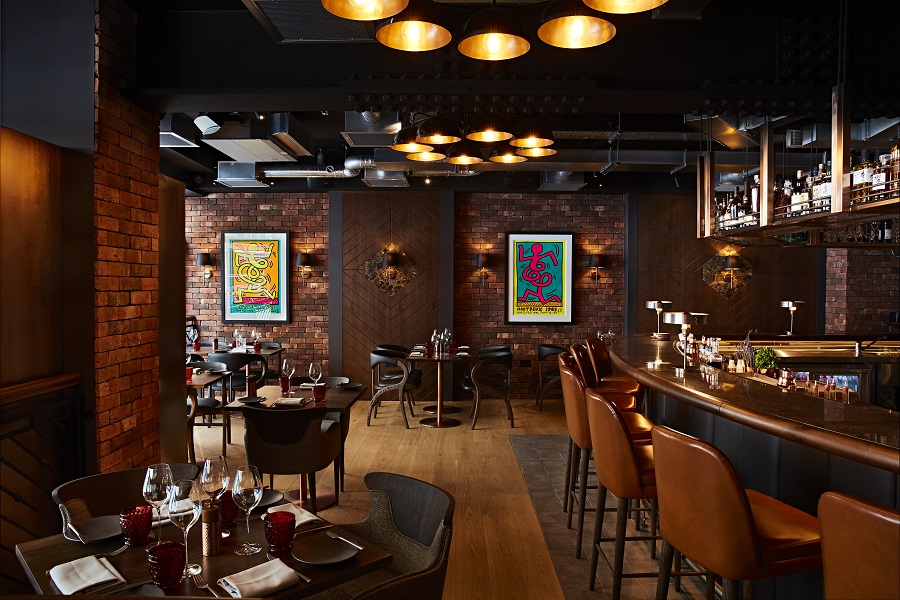 Bar and dining tables from inside Heritage Soho