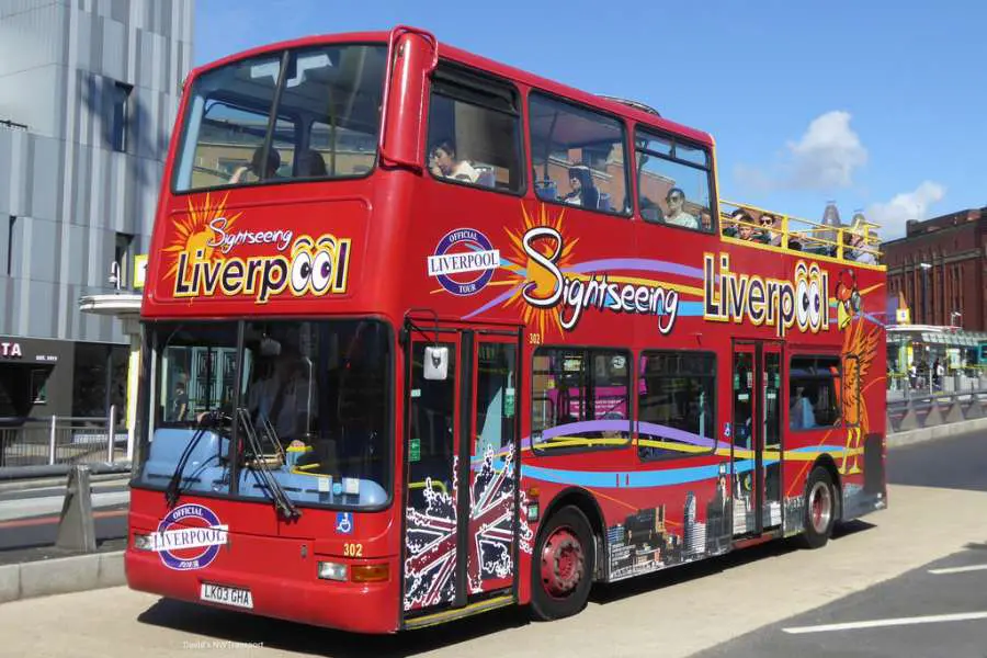 The Open Top Bus City Tour bus, driving across London.