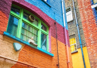 A close-up of a colourful building, located at Neal's Yard.