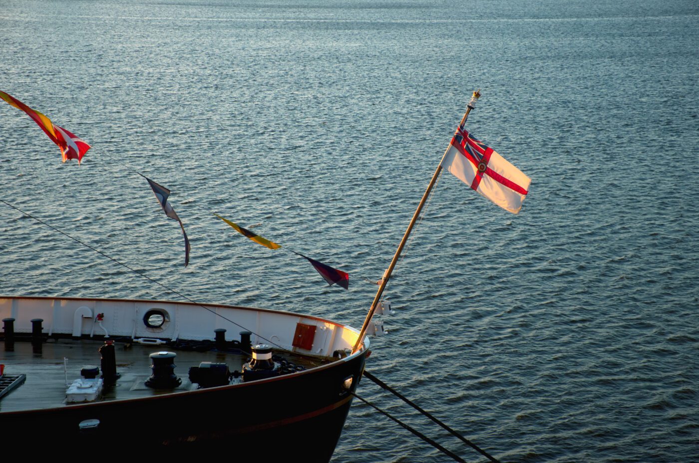 Flag at the stern of the yacht. Flag of Royal Yacht Squadron.Royal Yacht Britannia. Edinburgh