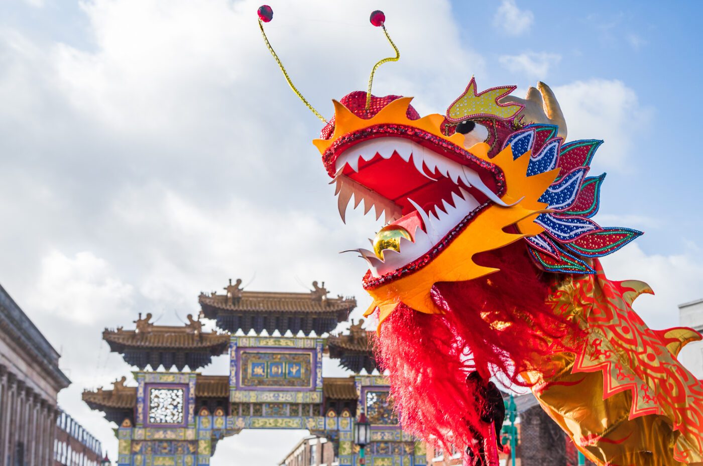 Chinese New Year celebrations with Dragon puppetry in Liverpool's Chinatown