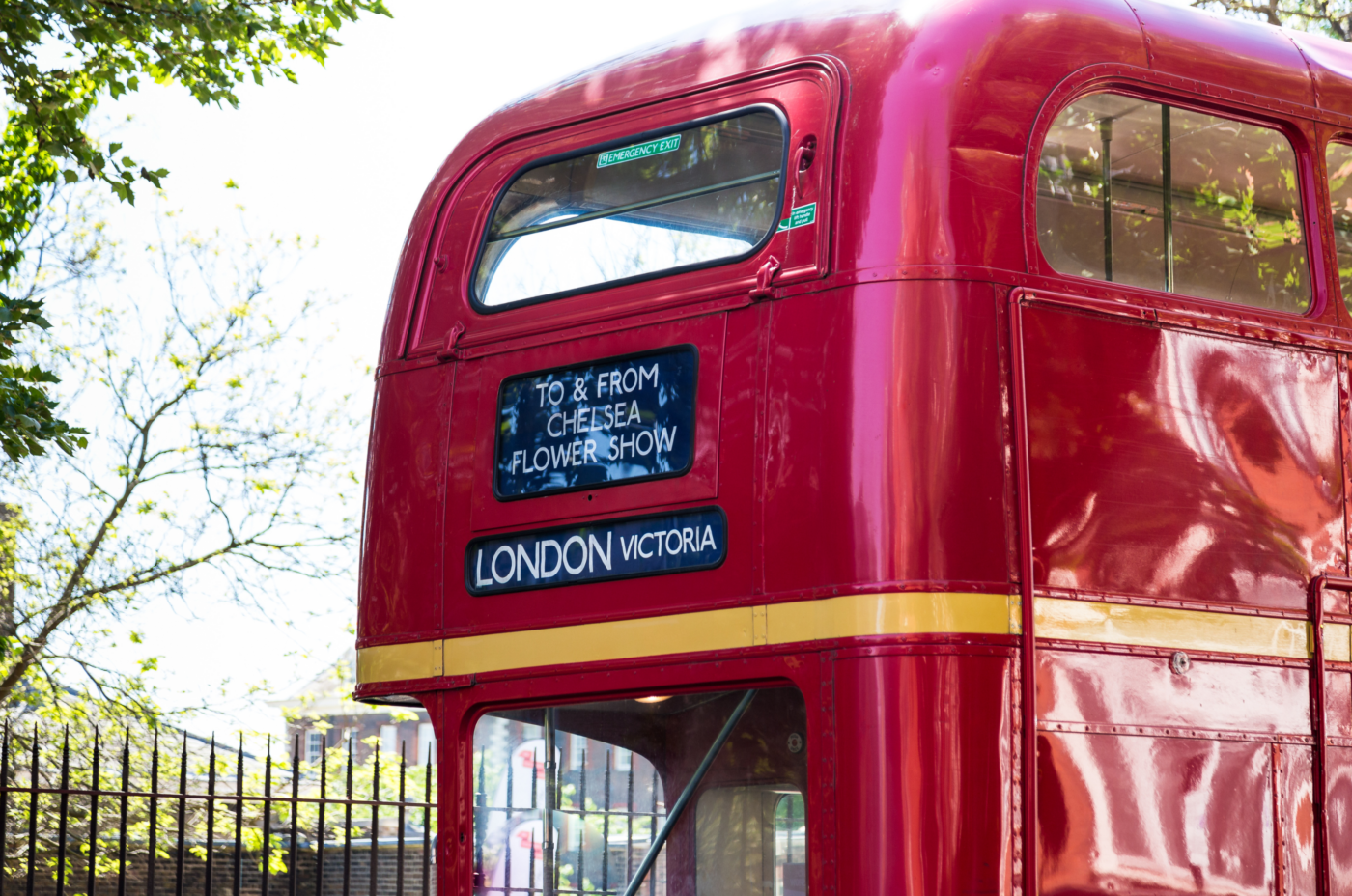 Red Victoria Double Decker Bus with a sign indicating the Chelsea Flower Show 2024