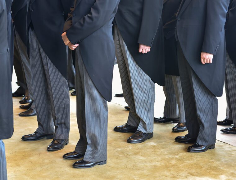 Men wearing the tail coats at the Royal Garden Parties