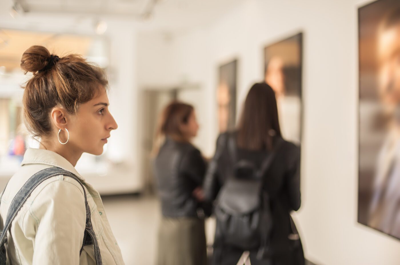 Group of woman looking at painting in the Walker Art gallery. Abstract painting