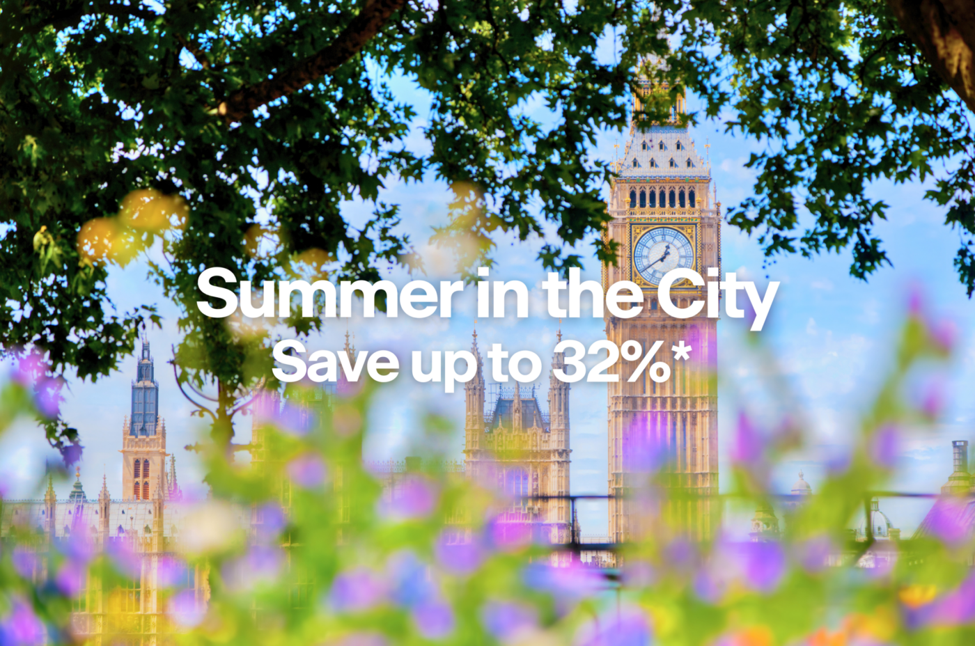 Big Ben and Parliament are seen through blooming flowers and tree branches. Text on the image reads: 