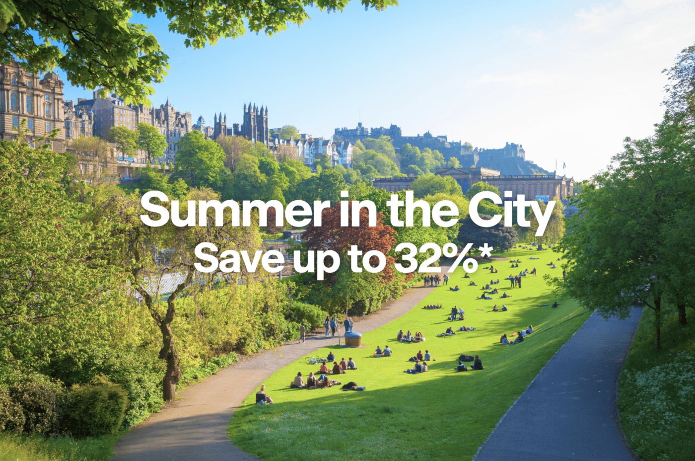 People relaxing on a sunny green lawn in a city park, with historic buildings and trees in the background. Large white text reads, 