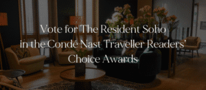 A stylish hotel lounge with modern seating and floral arrangements. Overlaid text reads: “Vote for The Resident Soho in the Condé Nast Traveller Readers’ Choice Awards.”.