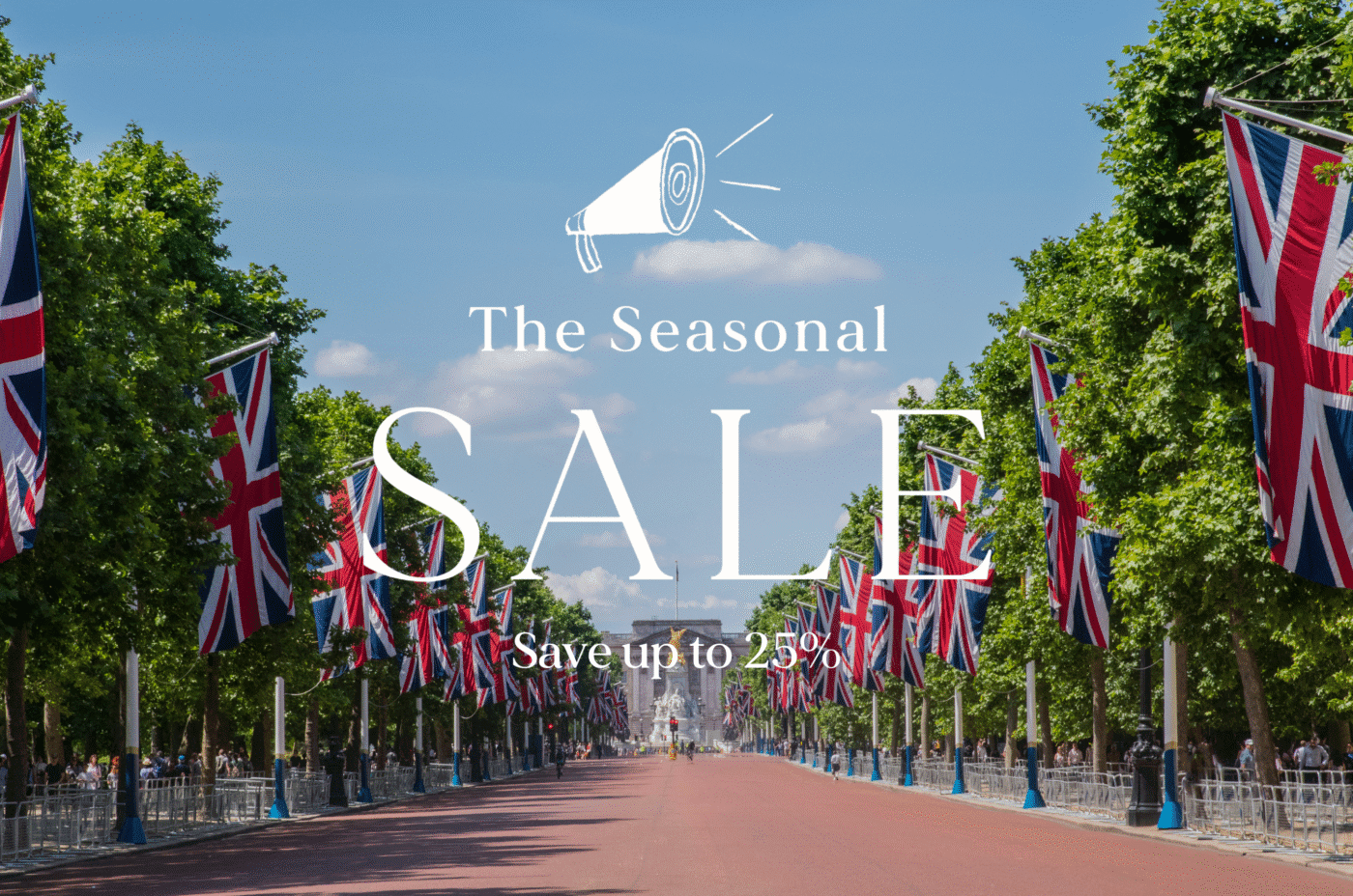 Union Jack flags line a wide road with trees on both sides and a distant building. Text over the image reads: 